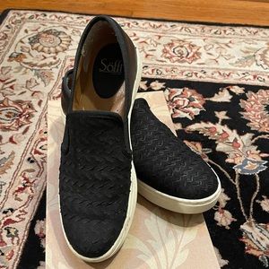 Black slip on shoe by Sofft. Size 8.5.